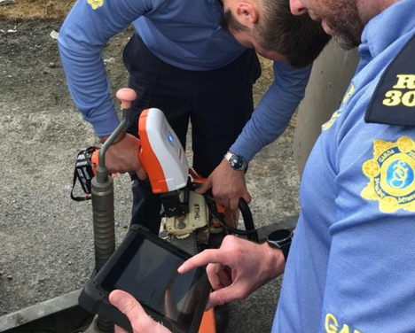 Photo of Gardai using Property Marking Machine